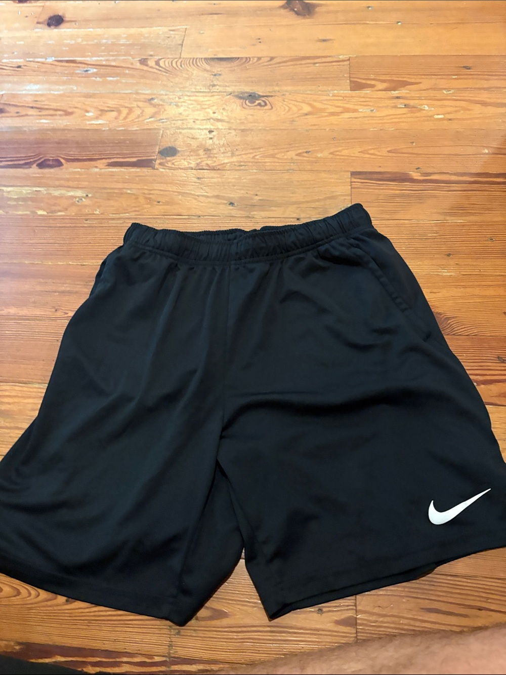 Nike Black Shorts with White Swoosh Logo